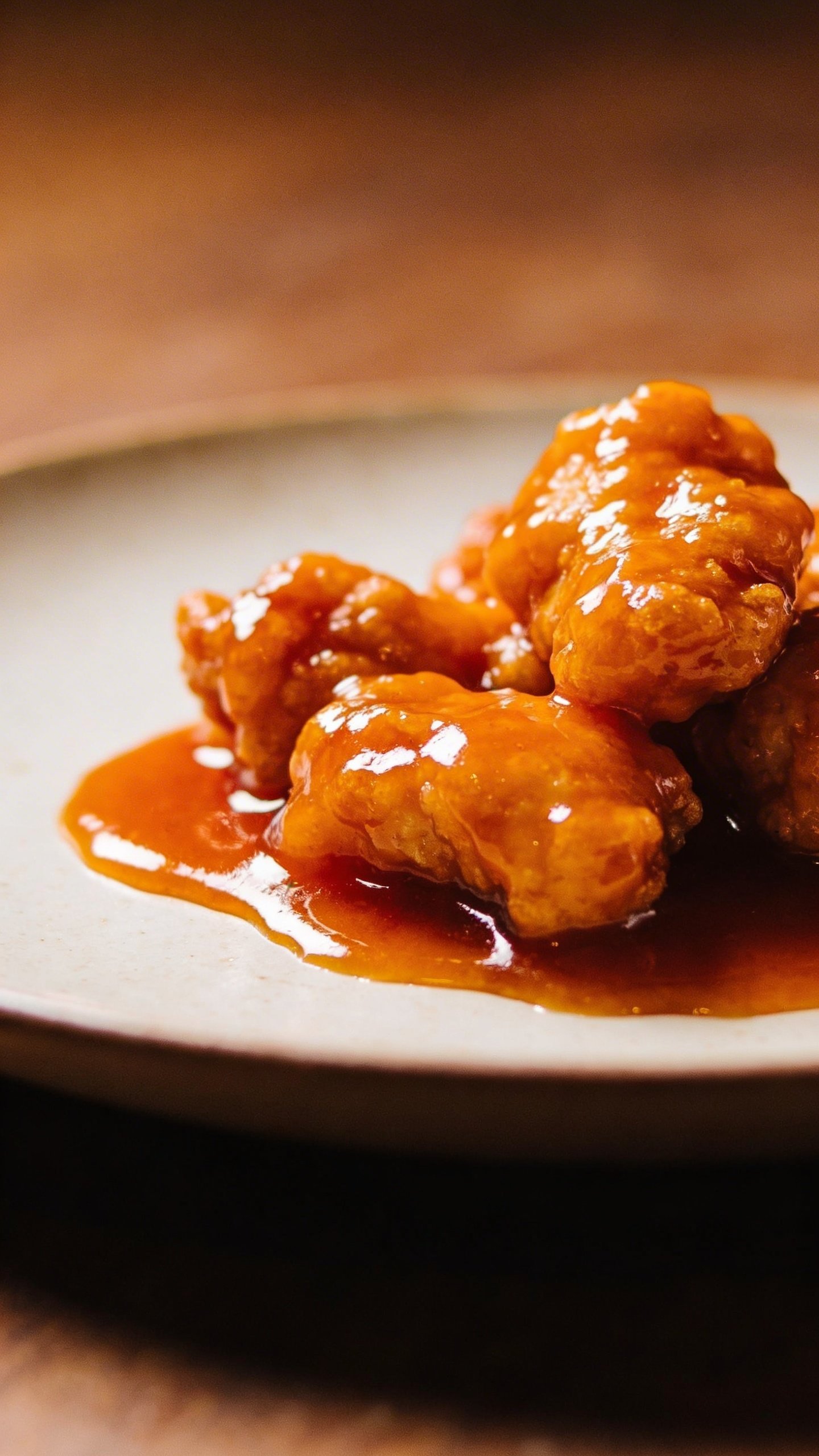 Orange Chicken Recipe: 15-Min Quick Crisp Hit 5 single plate with sticky orange chicken, vivid glaze closeup